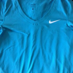 Blue v-neck Nike pro shirt